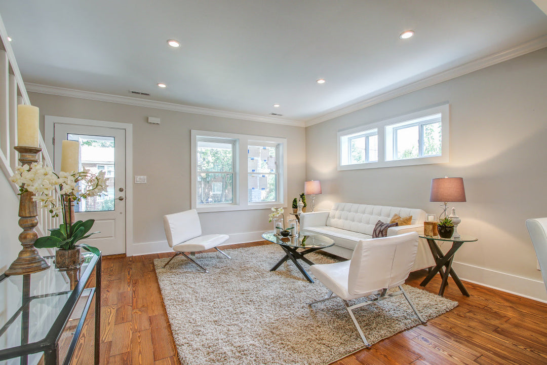 pine distressed hardwood flooring under a rug