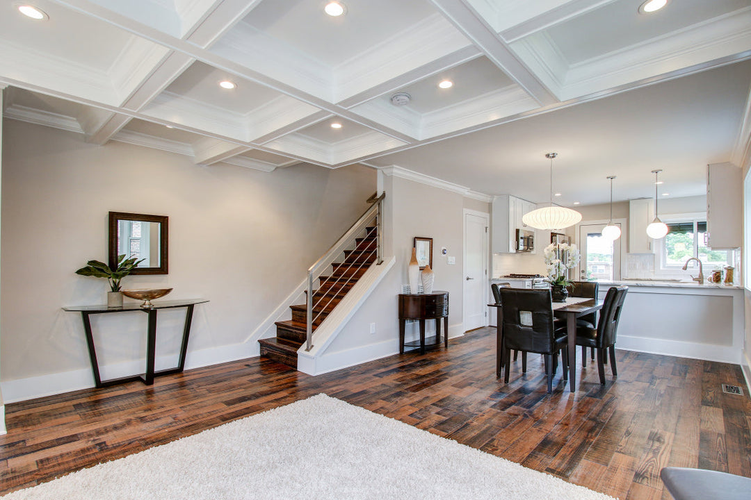 pine flooring in living room and dining room area