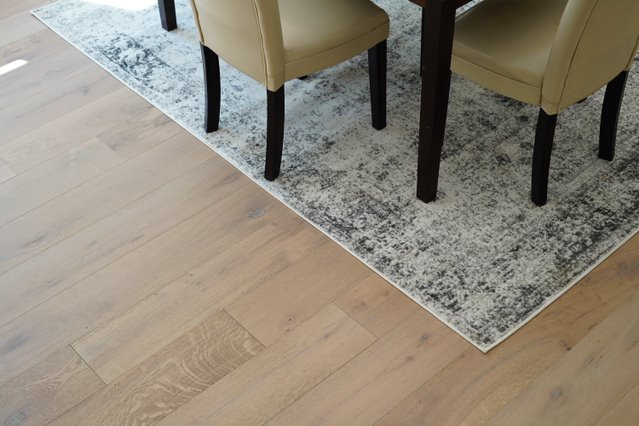 Hardwood floor with a rug