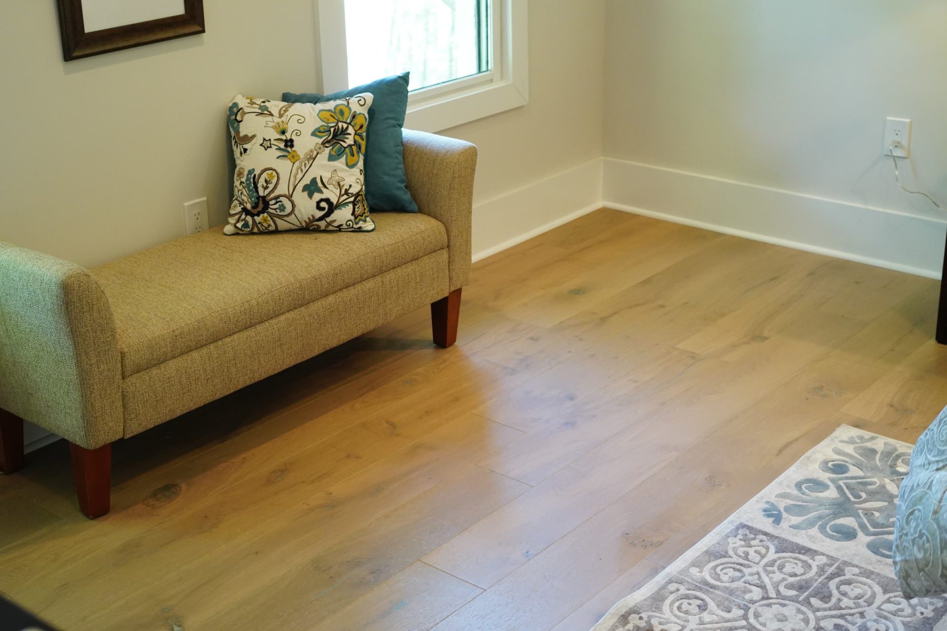 Hardwood floor and ottoman