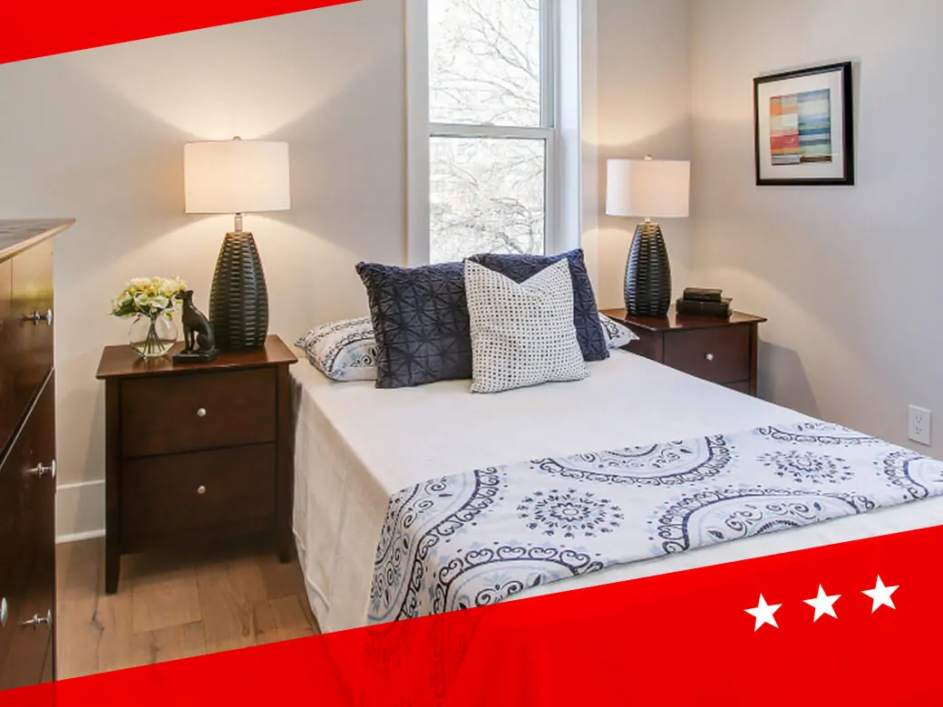bedroom with hardwood flooring
